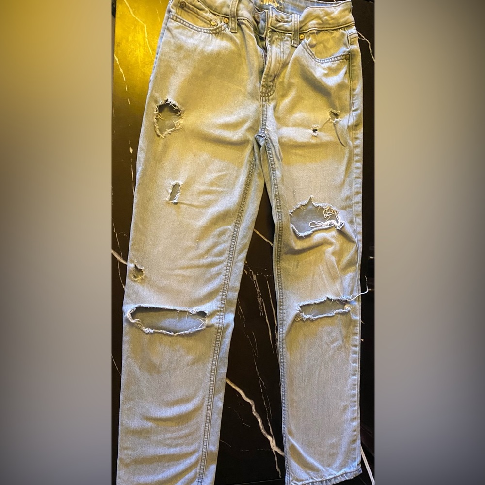 Light blue ripped jeans